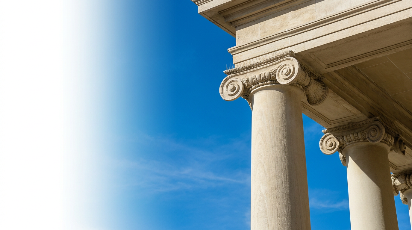 Classical stone columns against a blue sky